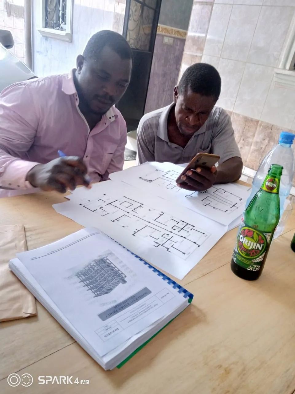 Team reviewing architectural plans